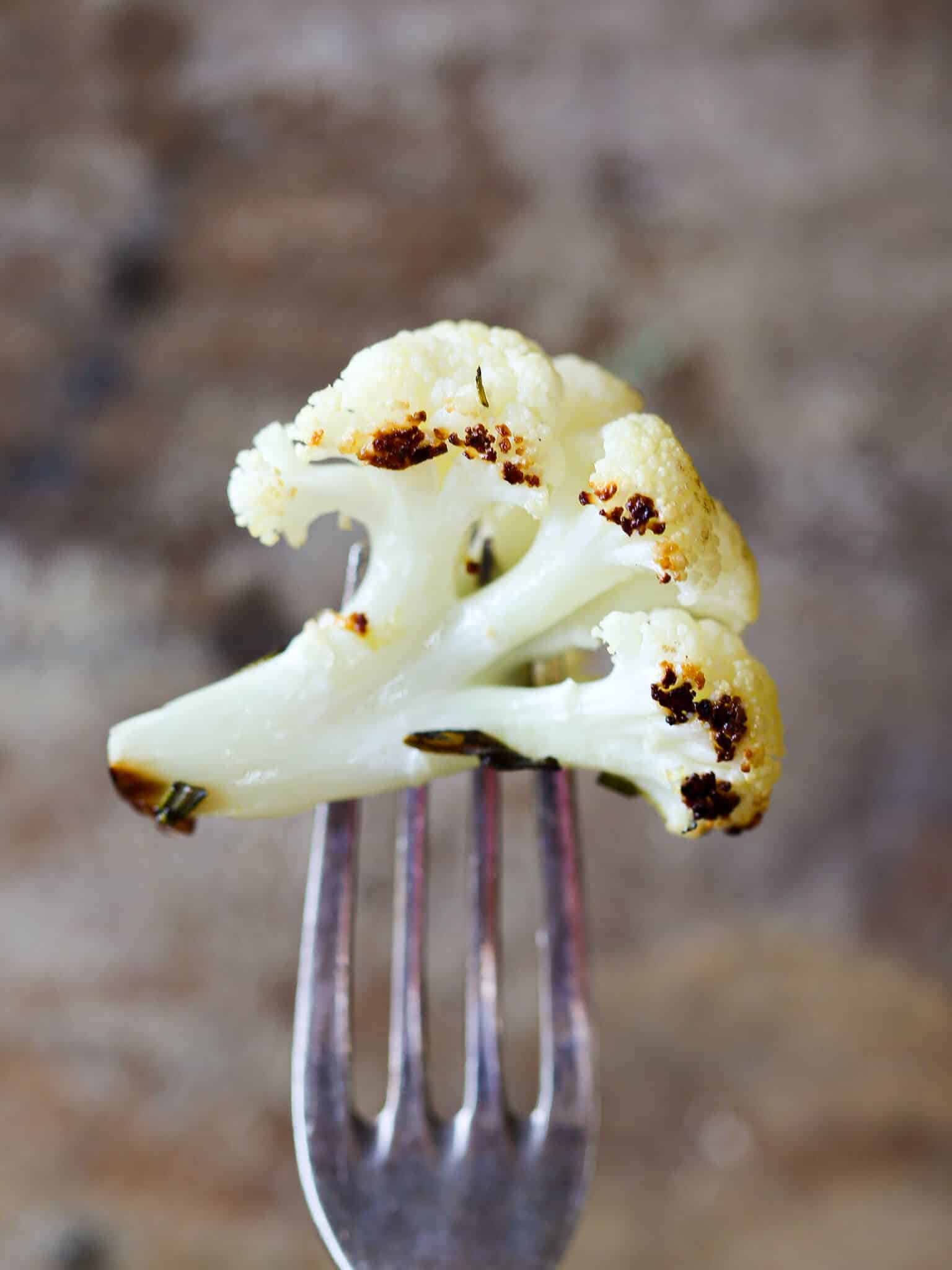 Easy Rosemary Lemon Roasted Cauliflower on fork