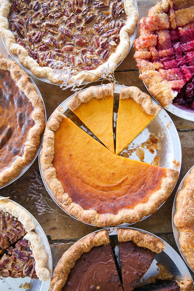 20 Best Thanksgiving Pie Recipes sliced in pie tins