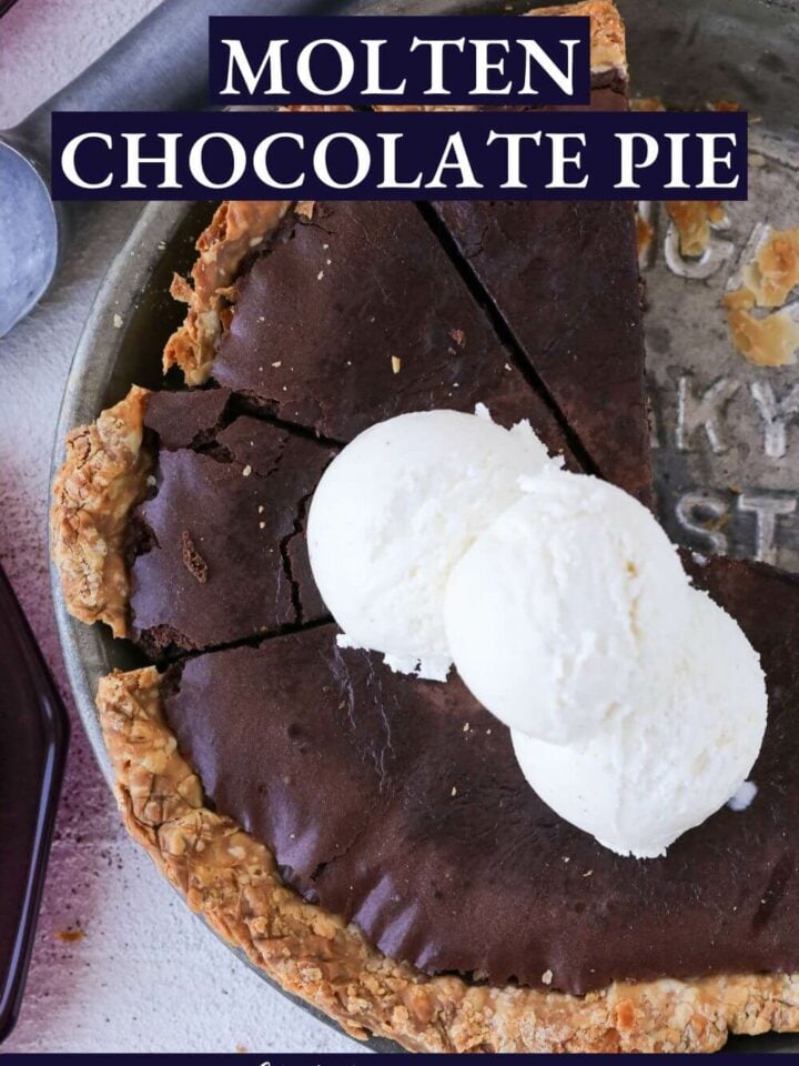An entire chocolate pie sliced.