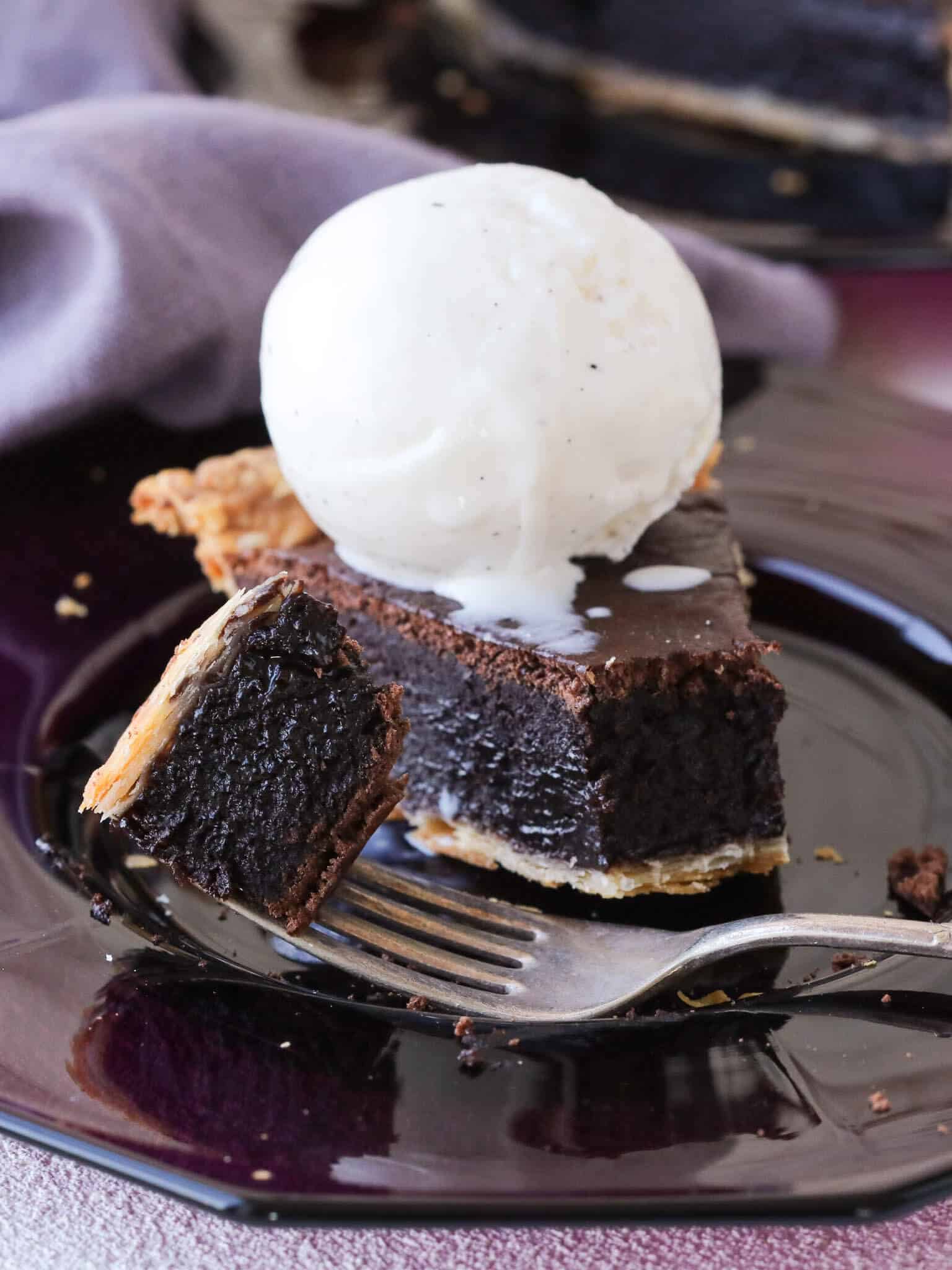 Easy chocolate pie with a scoop of vanilla ice cream.