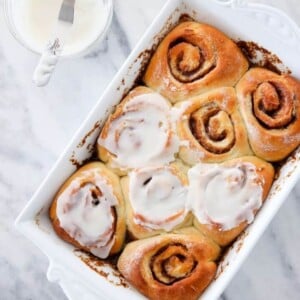 Sourdough Cinnamon Rolls in a white baking dish for Valentine's Day Desserts.