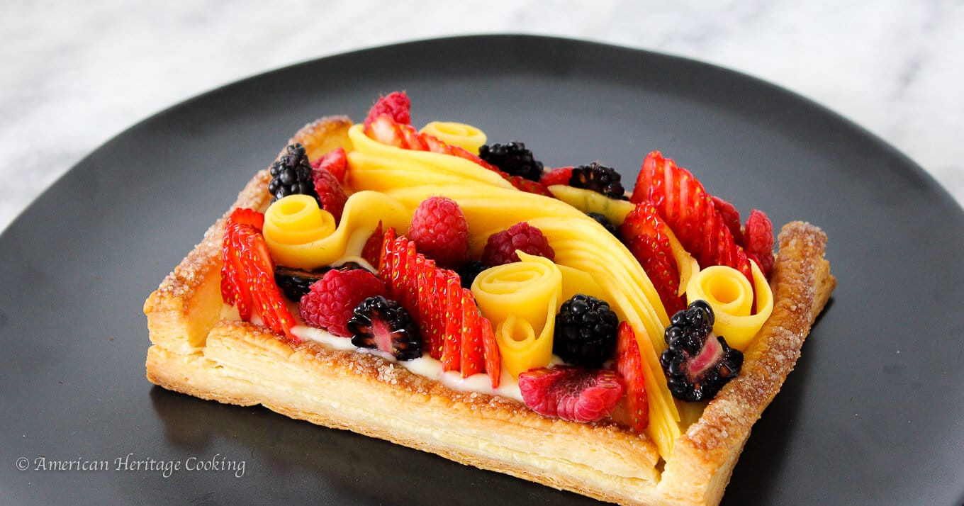 Flaky layers of puff pastry crust with fresh fruit topping.