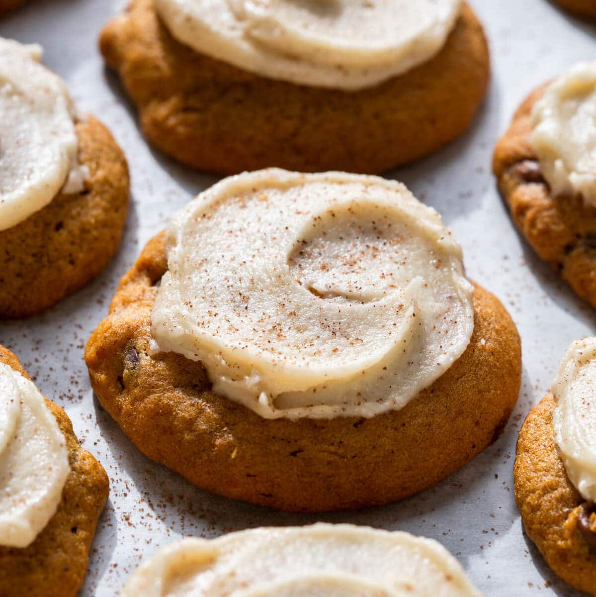 https://cheflindseyfarr.com/wp-content/uploads/2023/08/chocolate-chip-pumpkin-cookies-iced.jpeg