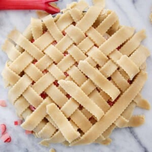 lattice pie crust on strawberry rhubarb pie.