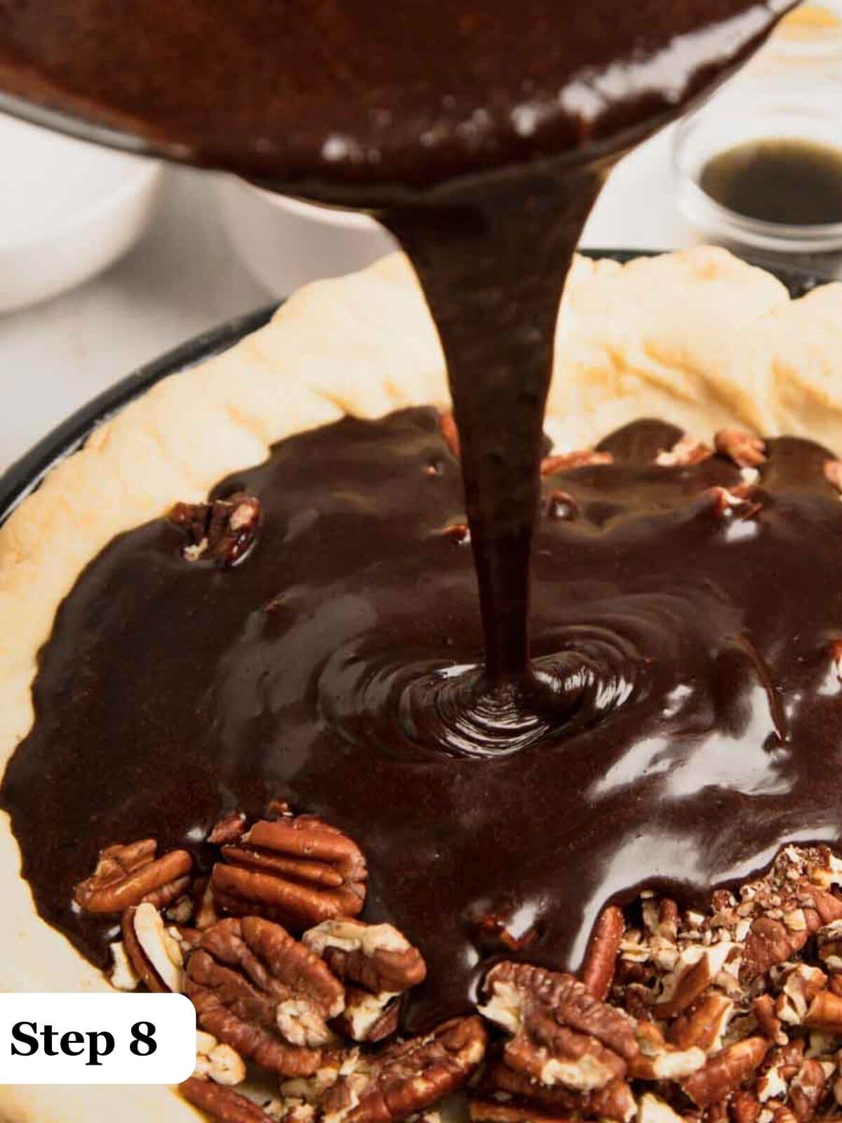 Text: Step 8, pouring chocolate pecan pie filling into a pie shell.
