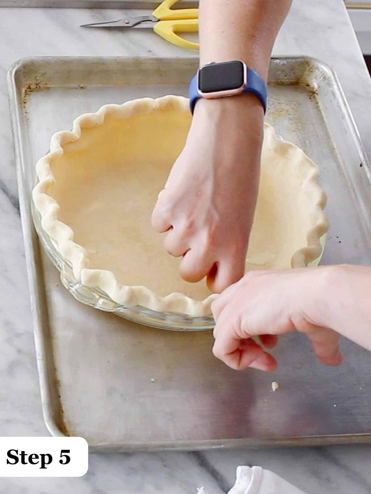 Text: Step 5, fluting a pie crust around a tin.