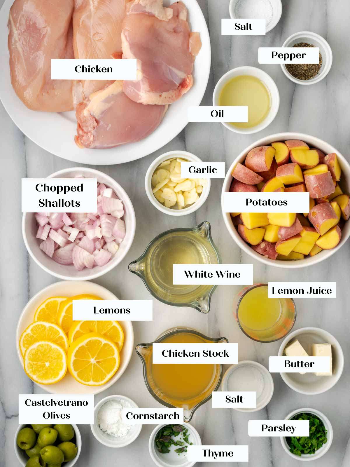 lemon chicken ingredients on marble.