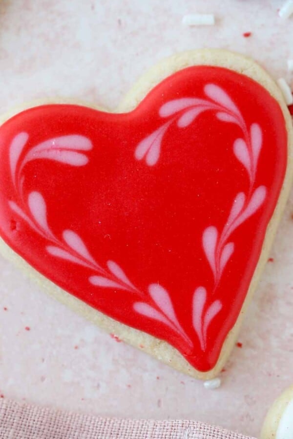 red heart decorated sugar cookie.