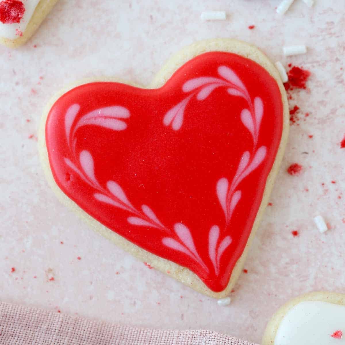 red heart decorated sugar cookie.