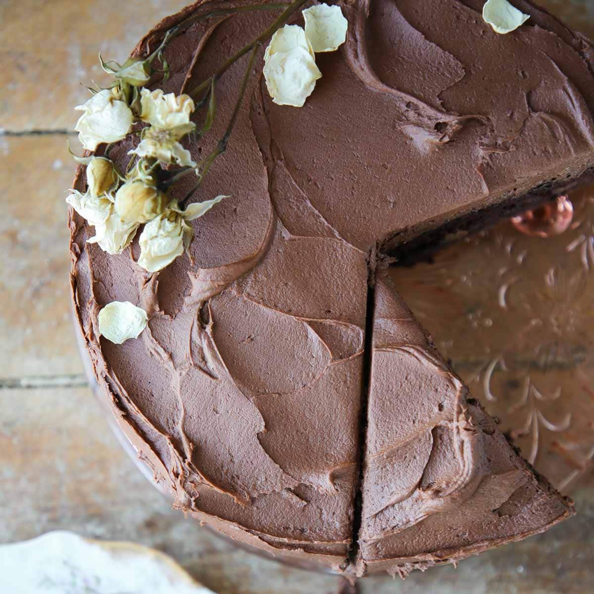 swirls of chocolate buttercream on cake.