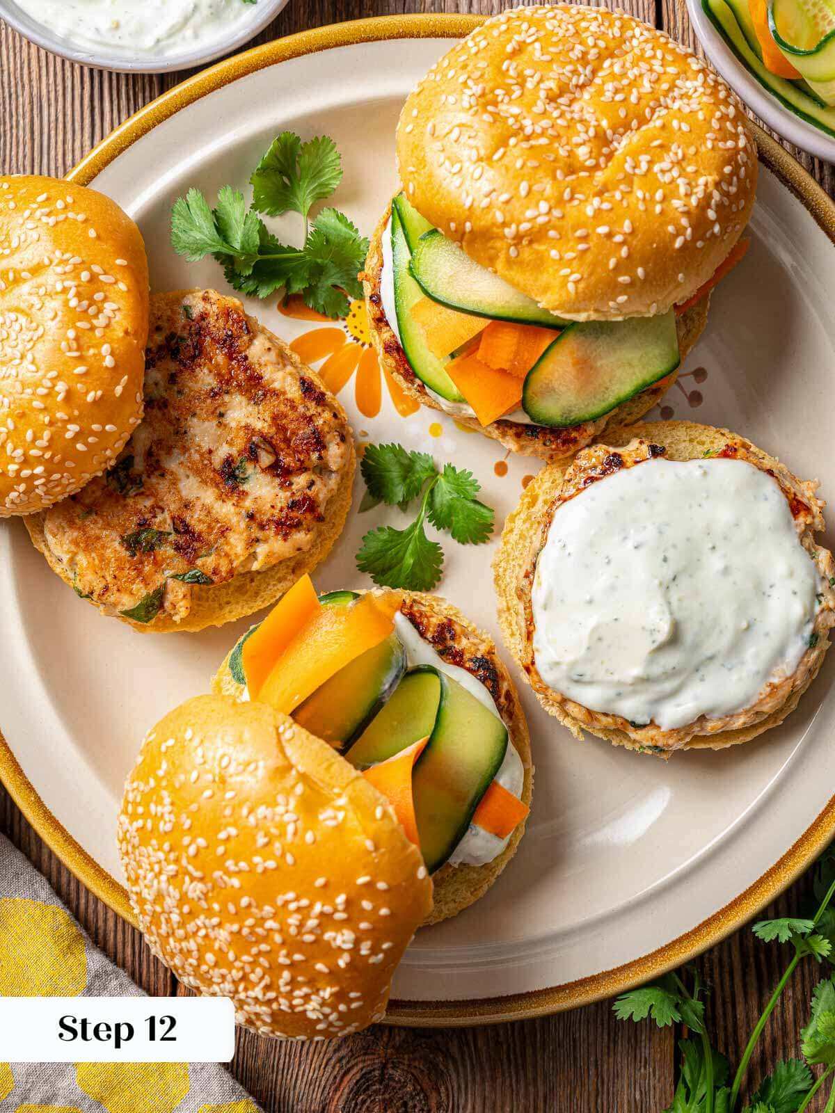 building perfect chicken burgers on a plate.