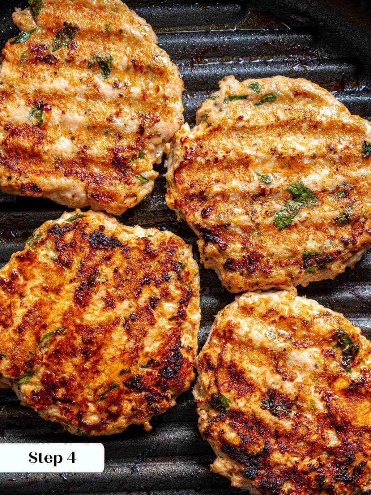 grilled chicken burgers in grill pan.