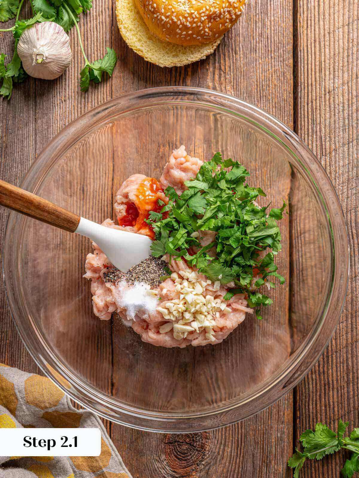 chicken burger ingredients in bowl ready for mixing.