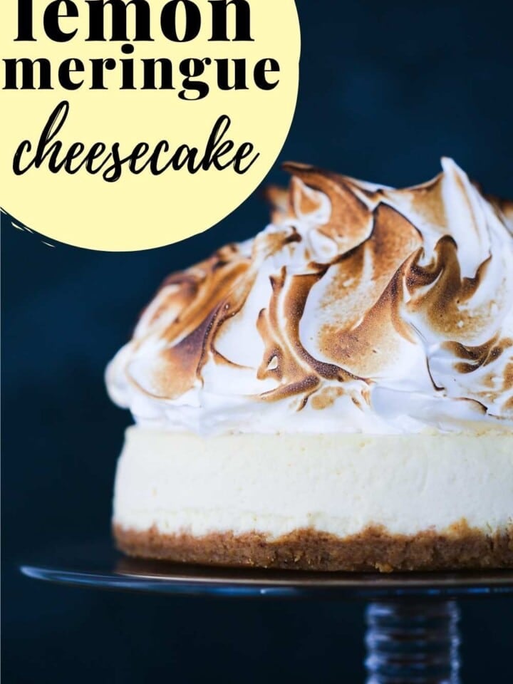 whole unsliced lemon cheesecake with meringue toasted on top.