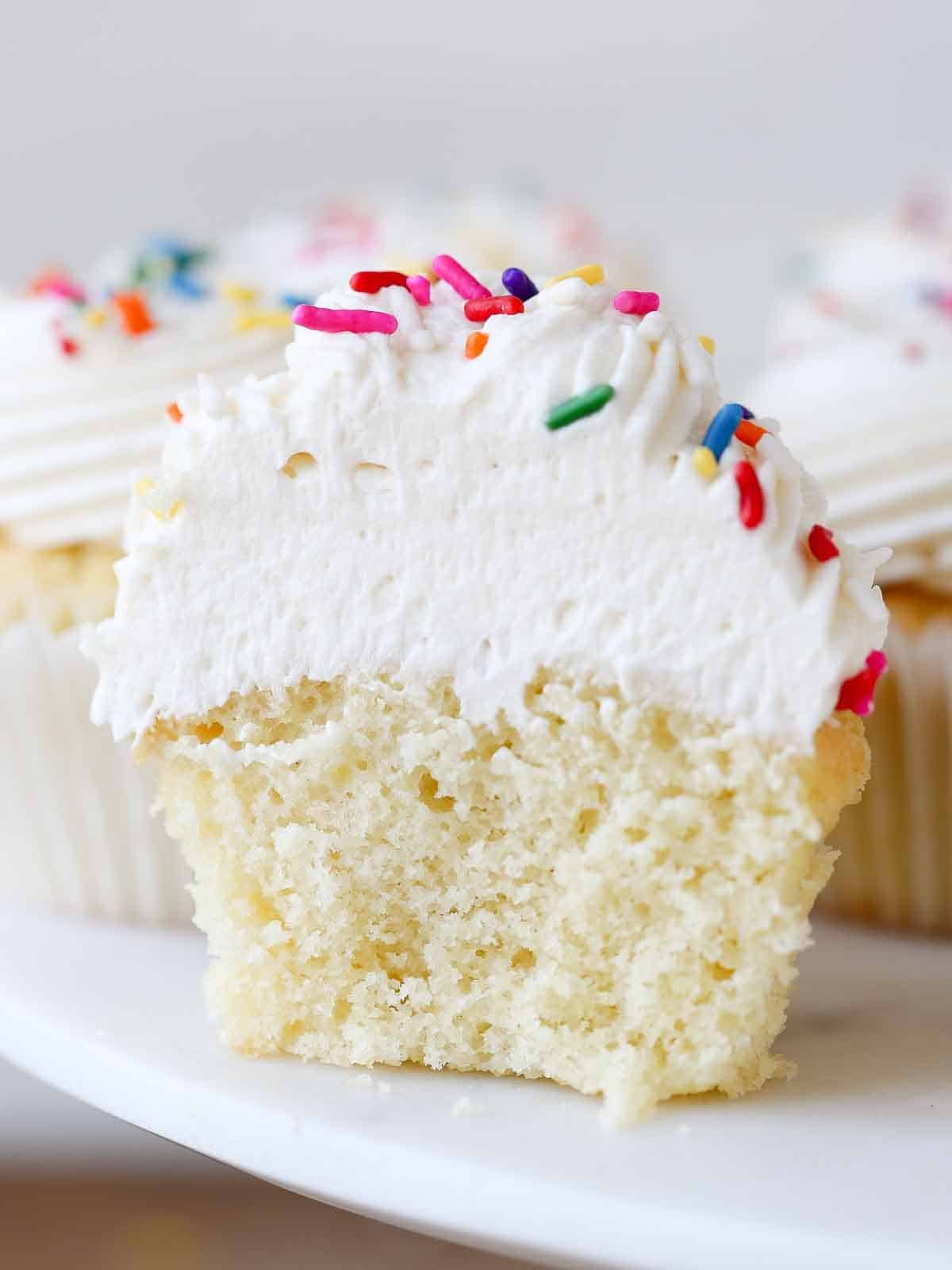 light fluffy ermine frosting on vanilla cupcake.