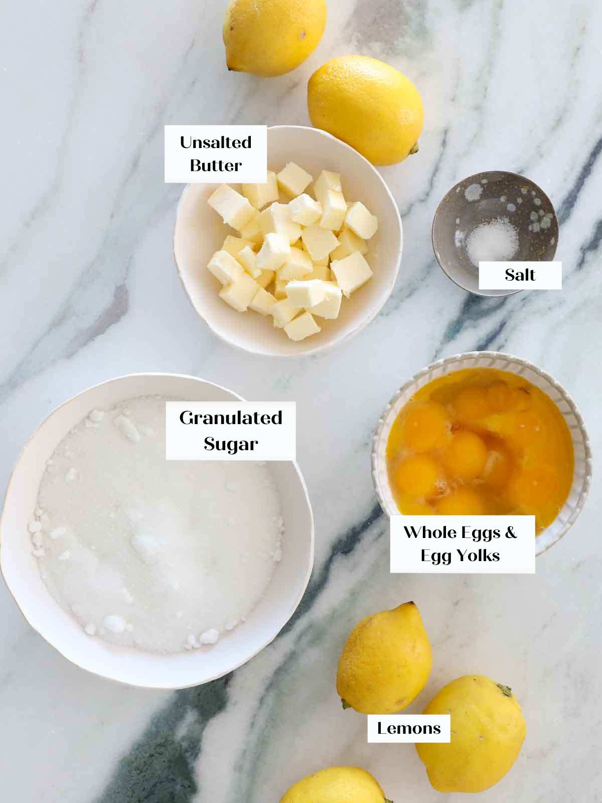 lemon curd ingredients on marble.