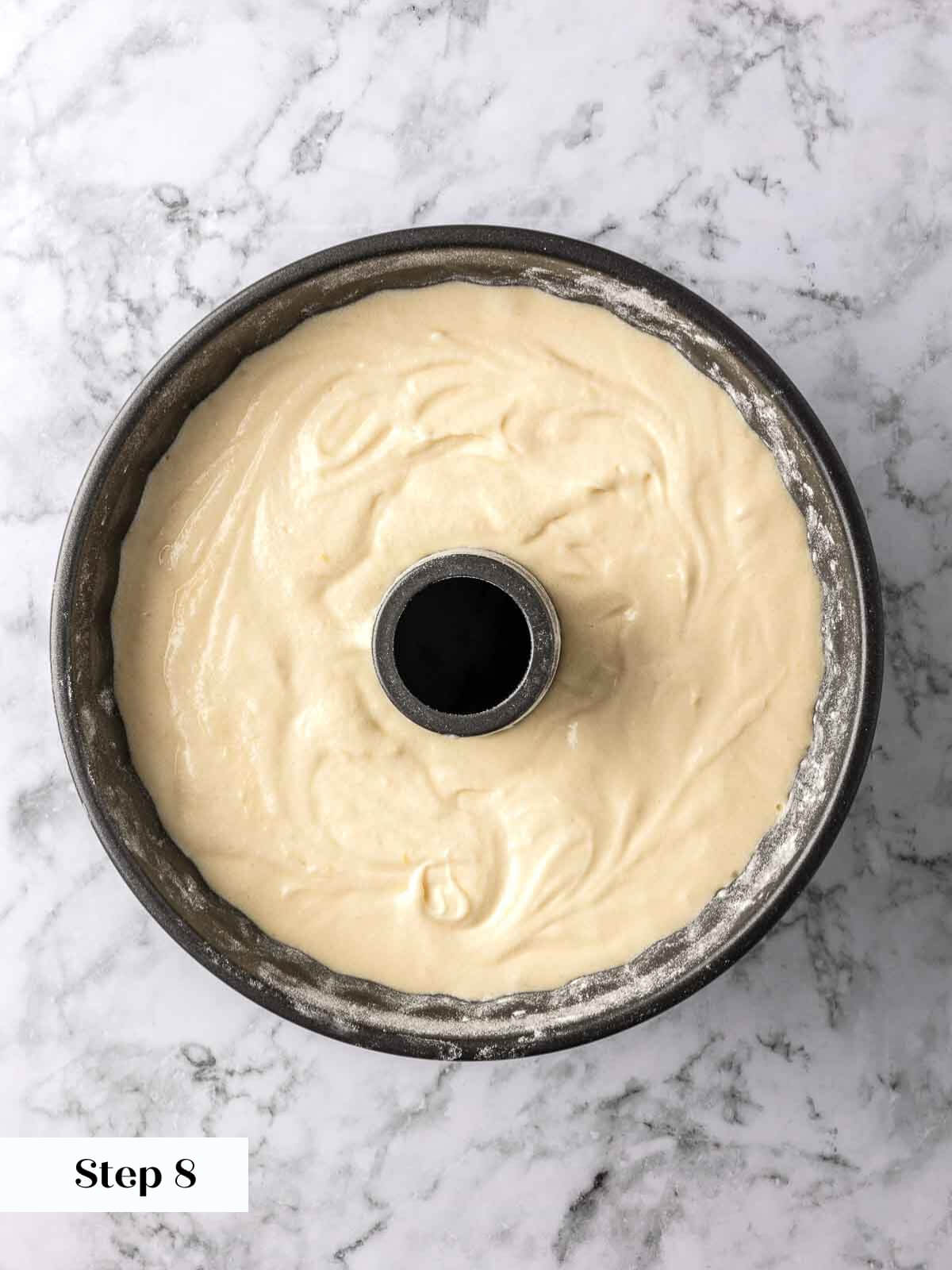 Lemon pound cake batter in a baking pan, ready for the oven.