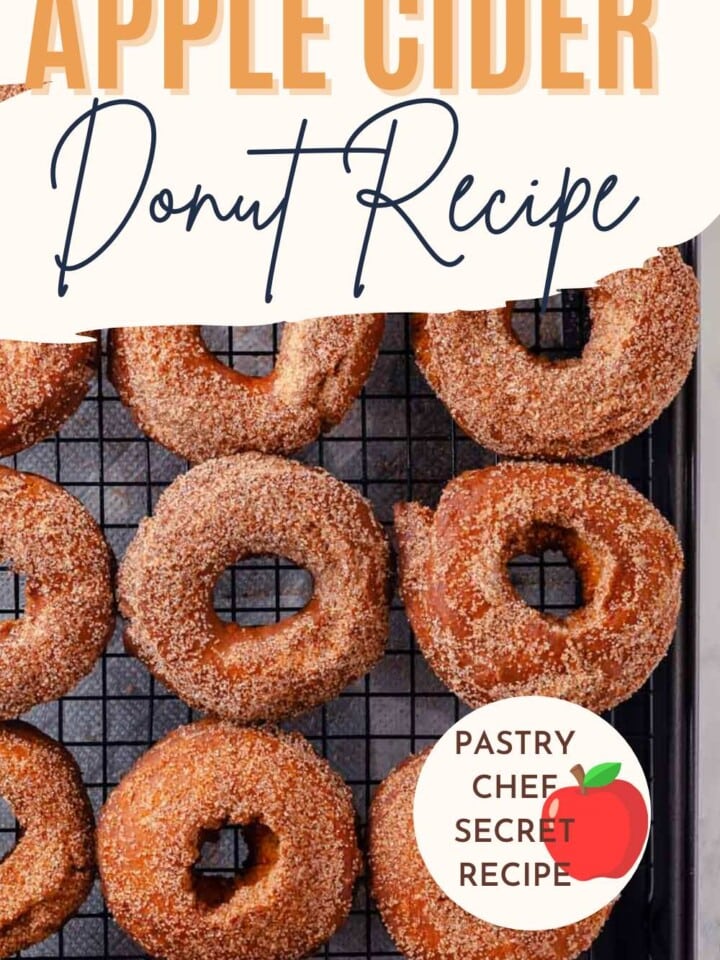 apple cider donuts cooling on wire rack with text overlay.