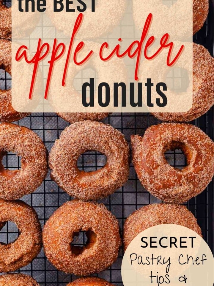 apple cider donuts cooling on wire rack with text overlay.