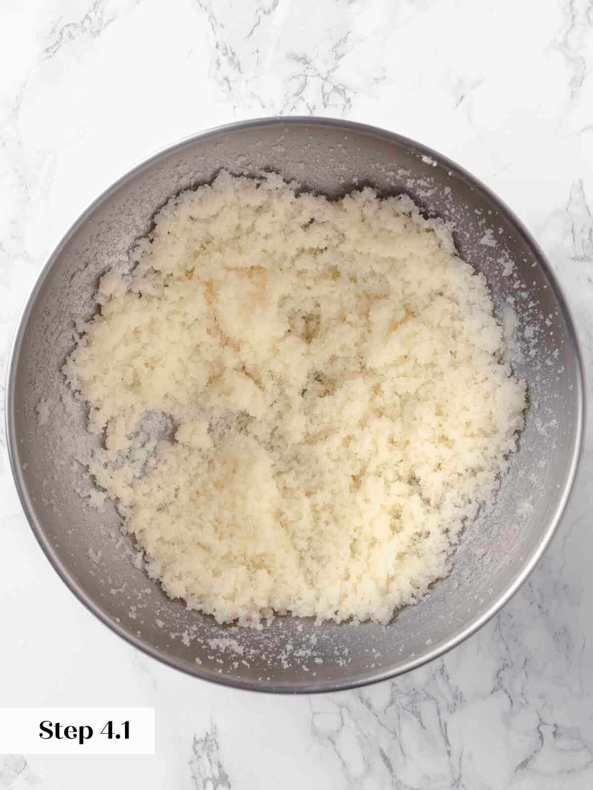 Butter and sugar being mixed for apple cider donuts.