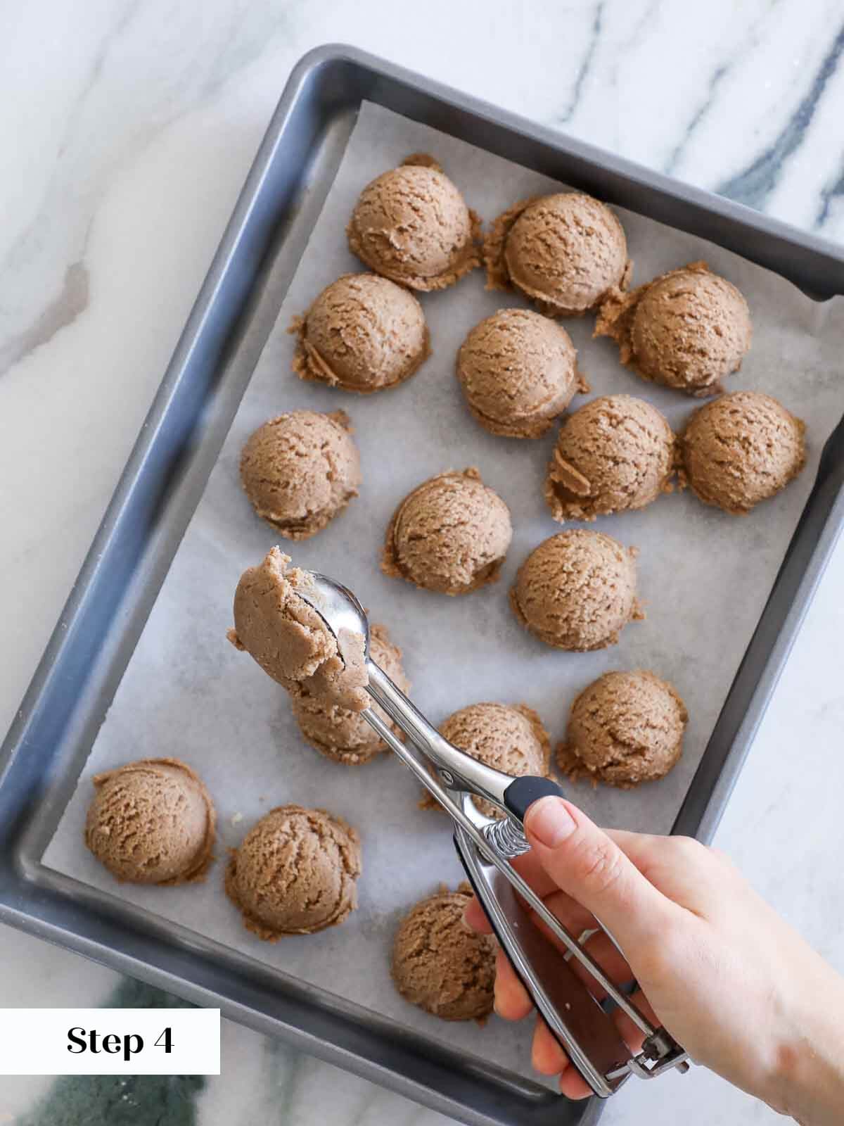 Process of portioning cinnamon sugar cookie dough.