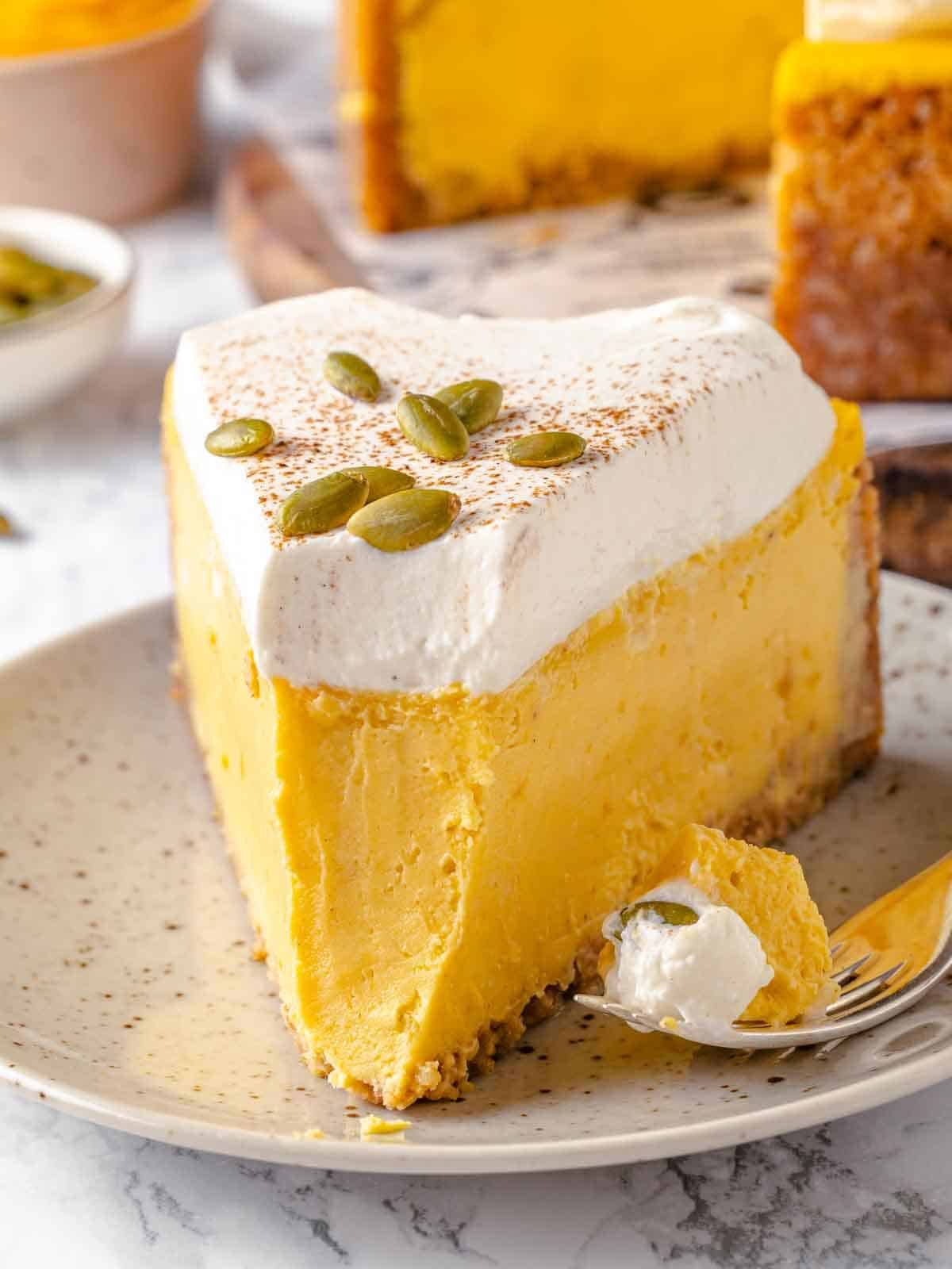 A forkful of pumpkin cheesecake.