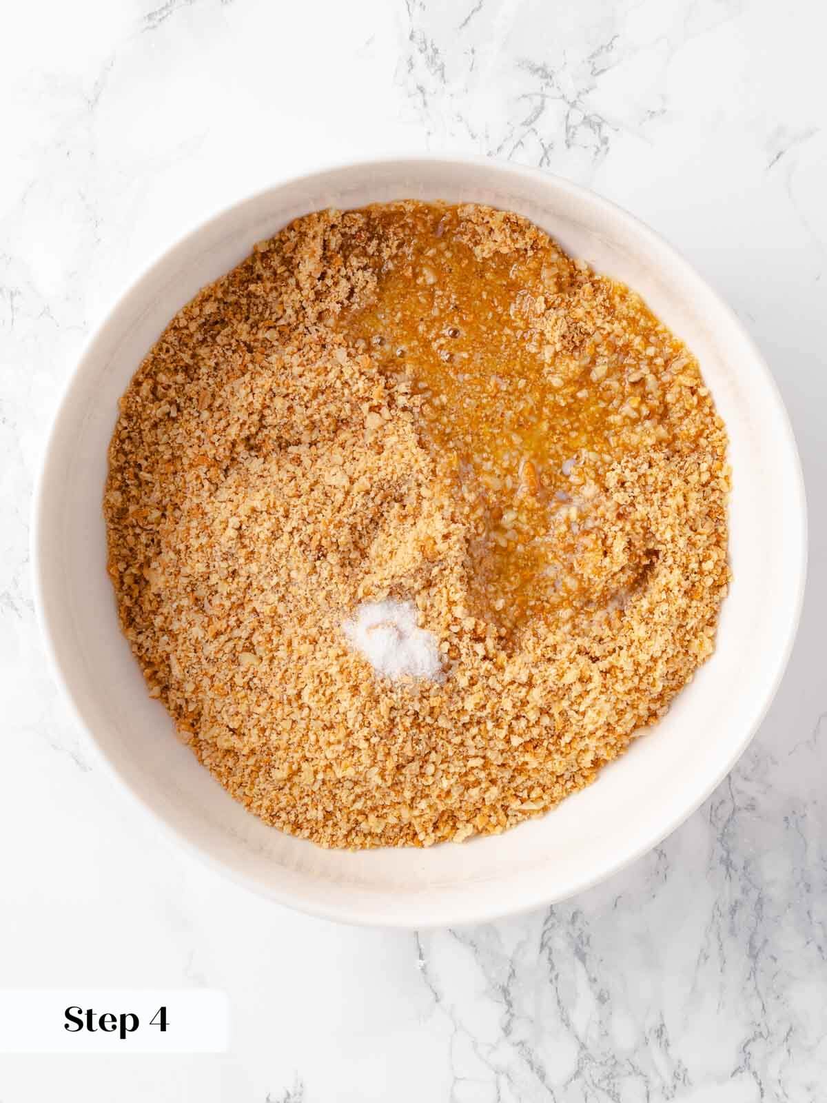 Mixing ingredients for the pumpkin cheesecake crust.