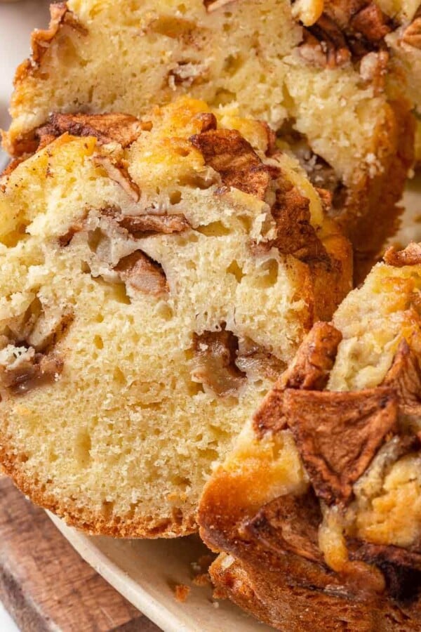 A close-up view of the interior of a Jewish apple cake showing apple slices.