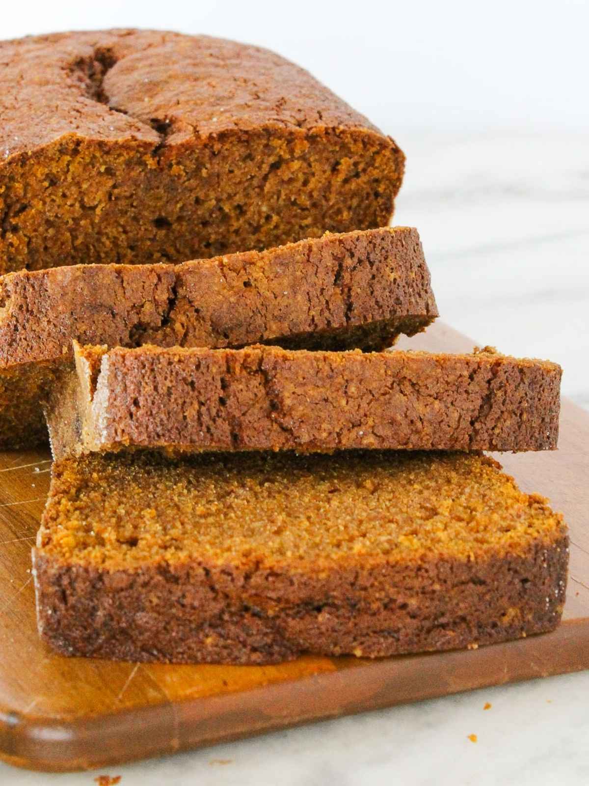 A close-up view of freshly sliced pumpkin bread, showing the moist texture.