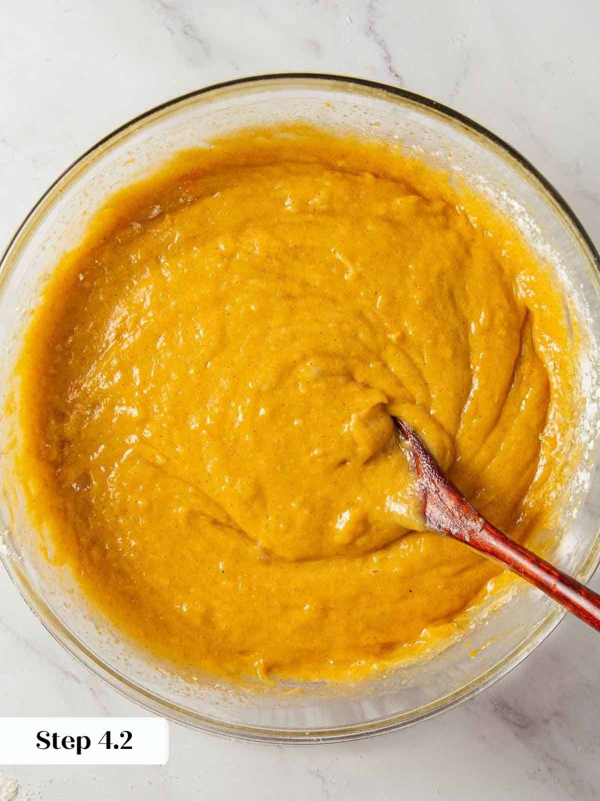 Smooth and creamy pumpkin bread batter ready for baking.