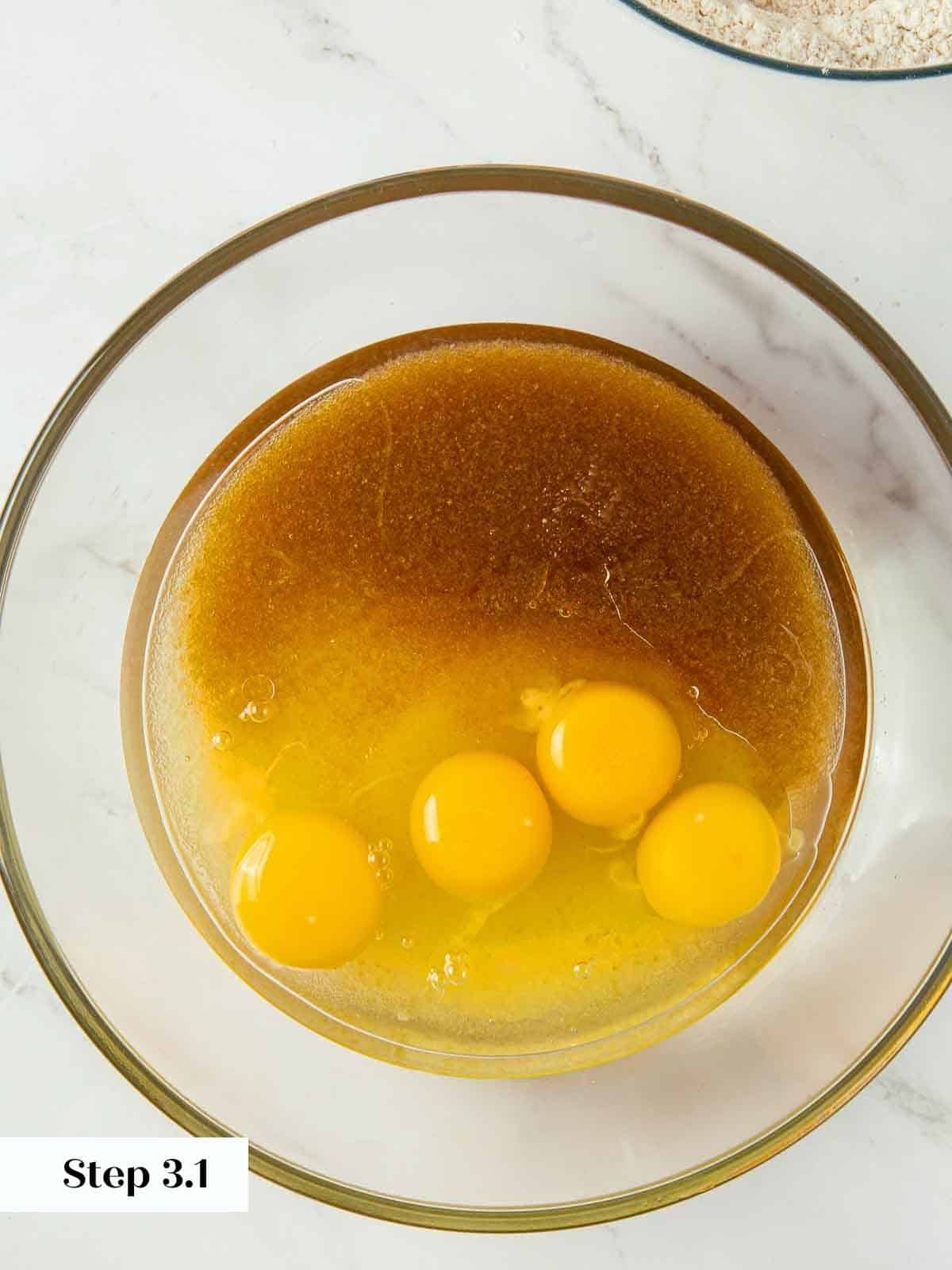 Wet ingredients for pumpkin bread in a bowl before mixing.