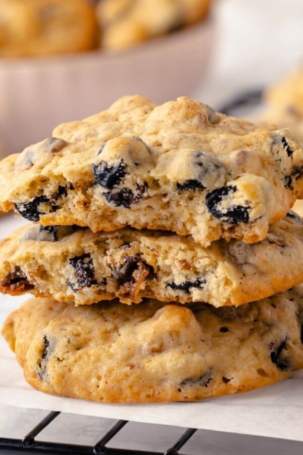 A hermit cookie broken open to reveal its chewy, fruit-filled interior.