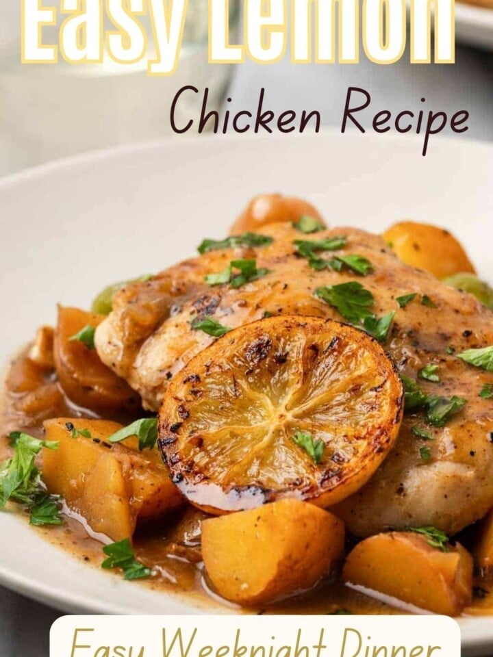 Lemon chicken on a plate with potatoes.