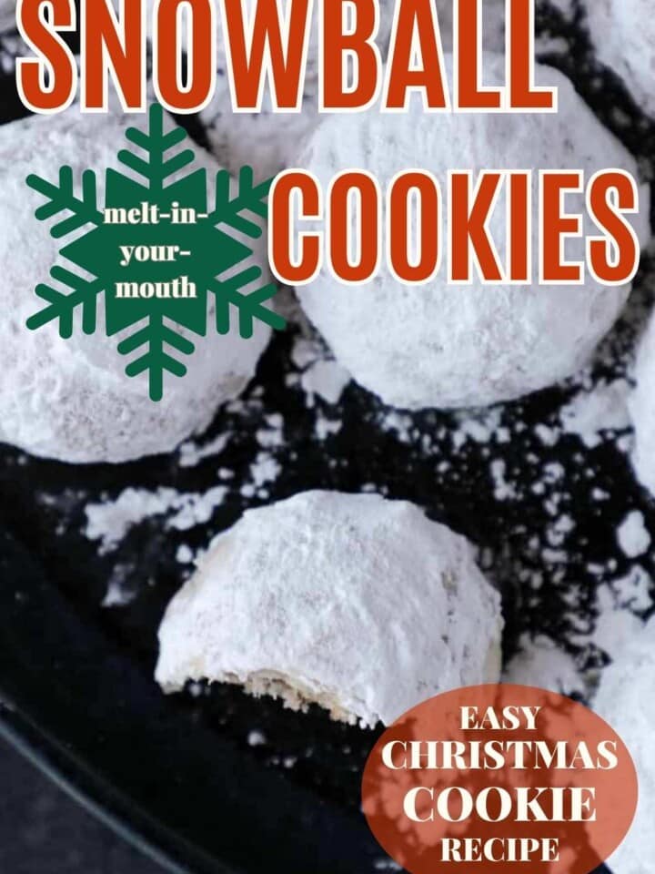 Close-up of a snowball cookie showing its soft, crumbly texture and sugary coating.