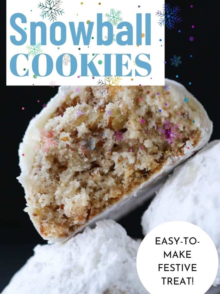 A stack of snowball cookies with powdered sugar falling like snow in the background.