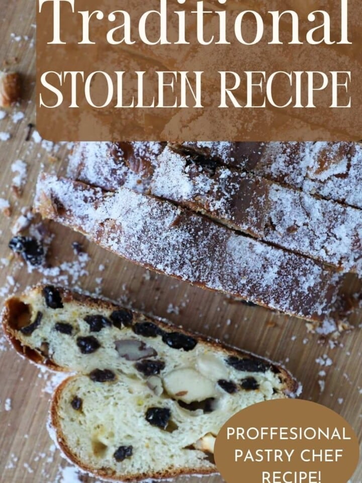 Image of a sliced traditional stollen bread showing marzipan filling and dusted with powdered sugar.