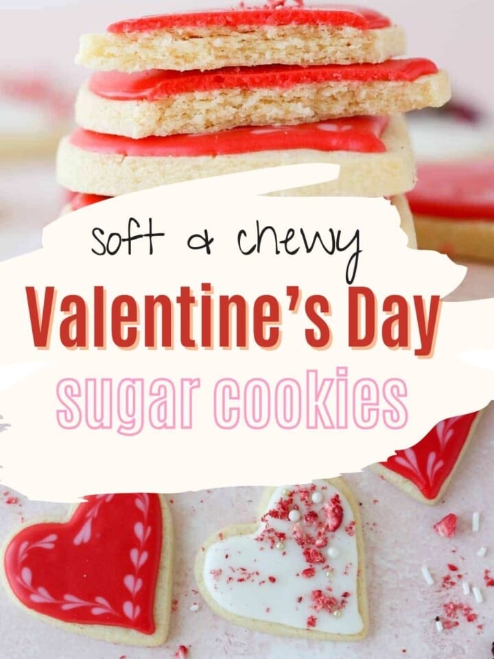 Valentine’s cookies decorated with intricate designs using royal icing and sprinkles on a festive table.