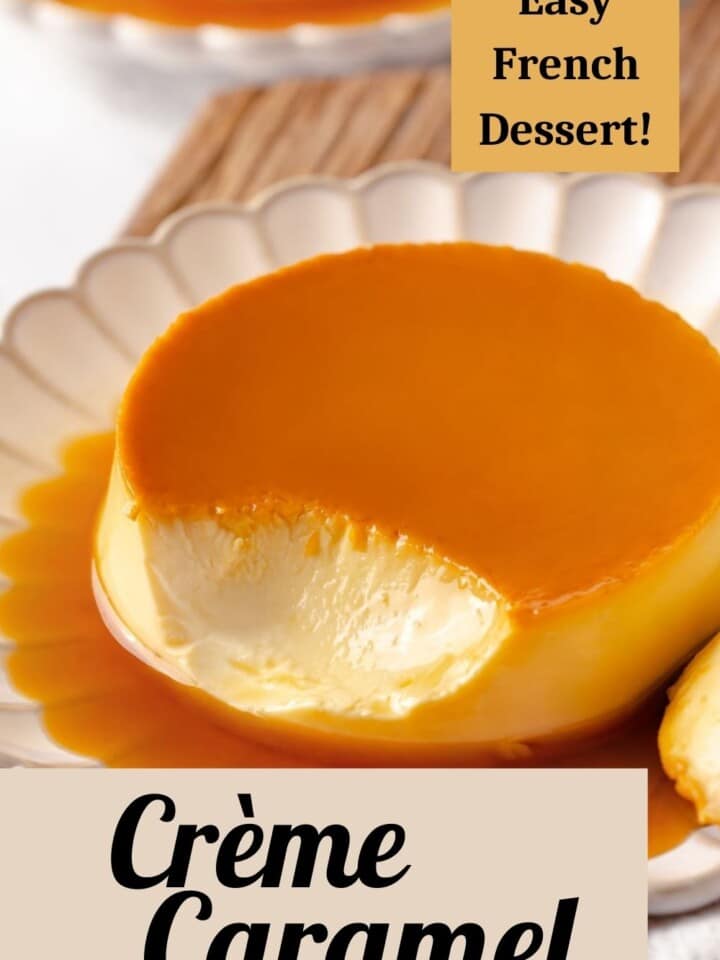 French-style crème caramel served on a white plate with caramel dripping down the sides.