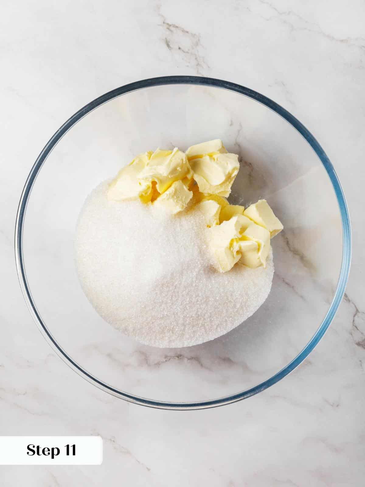 Butter and sugar being incorporated into meringue to create a silky cupcake batter.