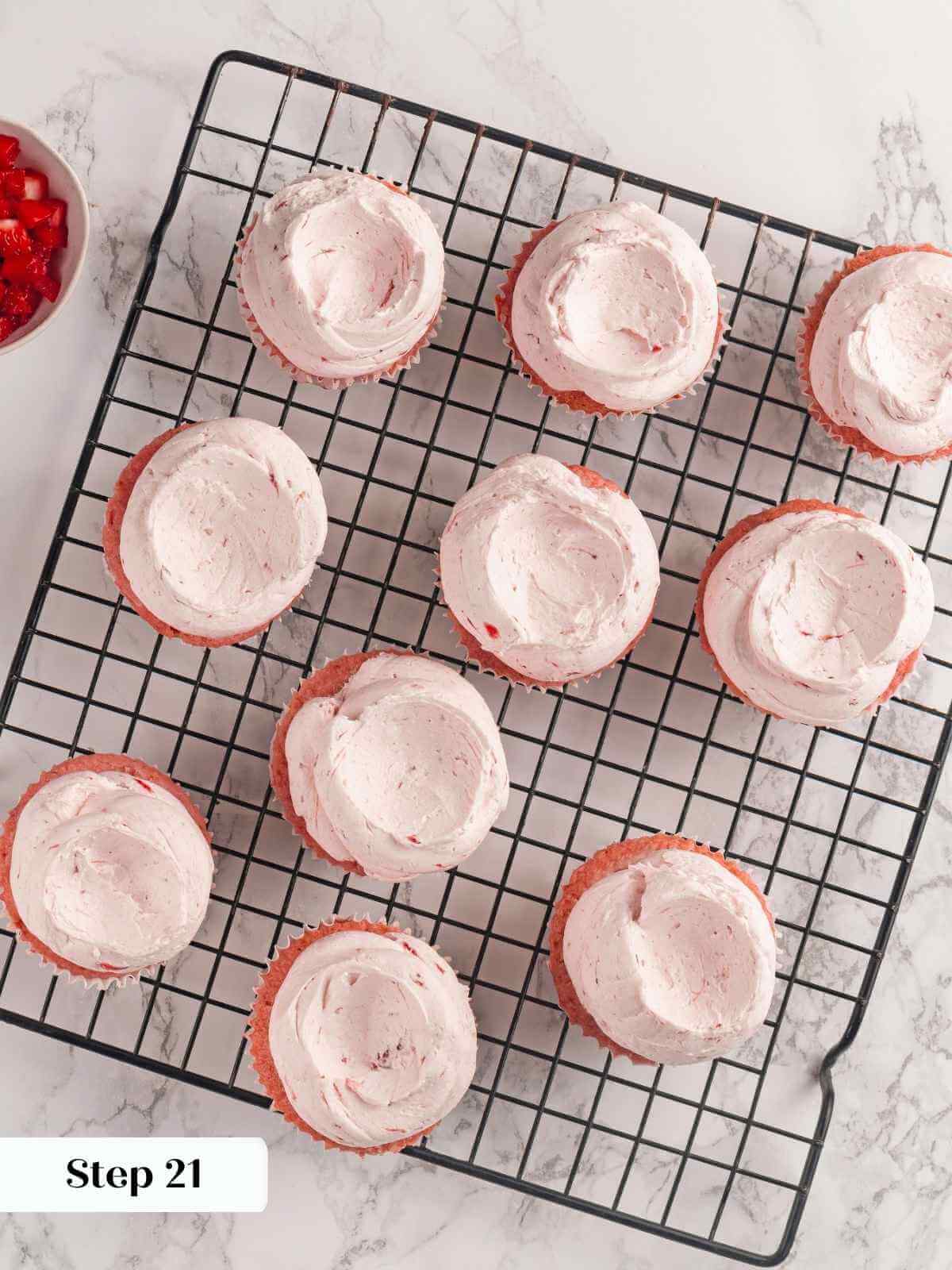 freshly frosted strawberry cupcakes.