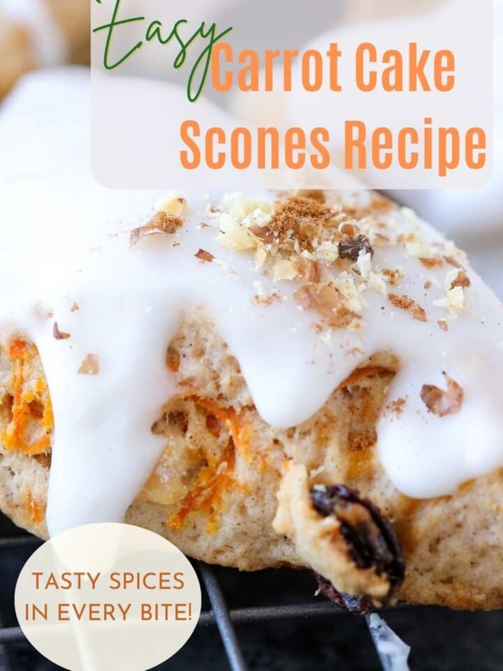 Freshly baked Carrot Cake Scones showing visible shredded carrots and a smooth cream cheese topping.