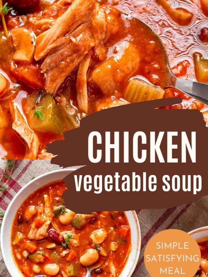 Close-up of homemade chicken vegetable soup with tender chicken and diced carrots.