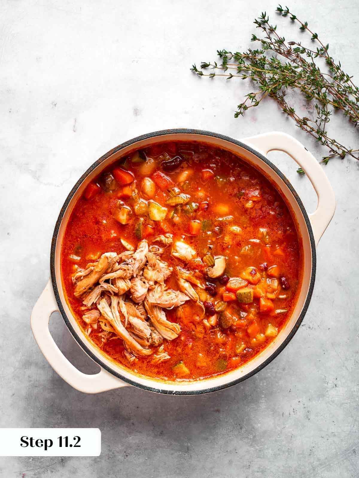 freshly shredded chicken added to the soup.