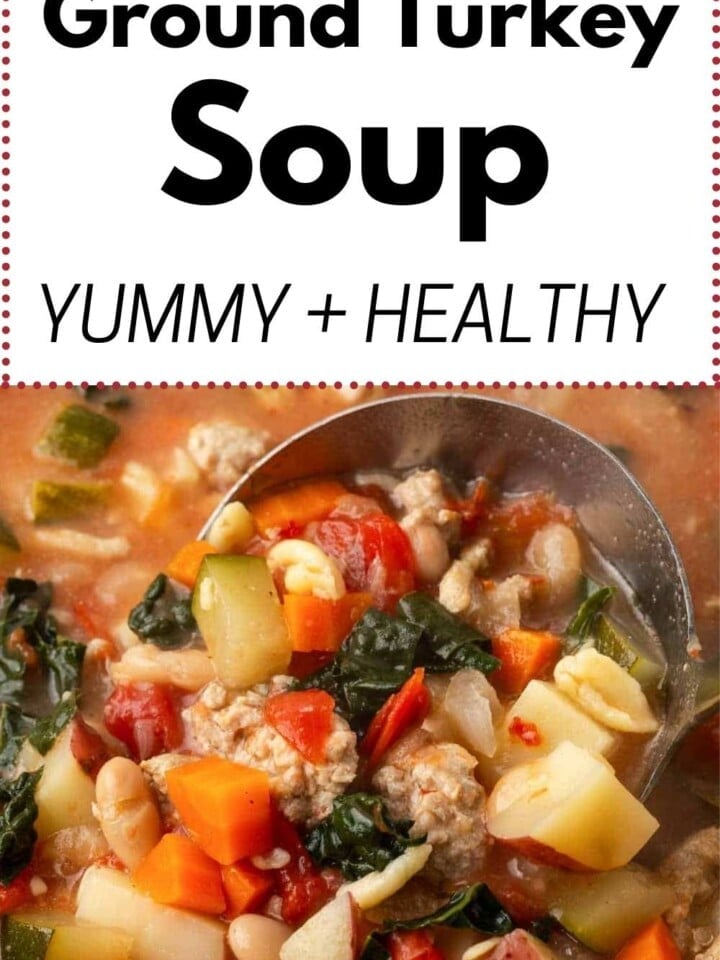 A spoonful of savory ground turkey soup with a rich broth and assorted veggies.