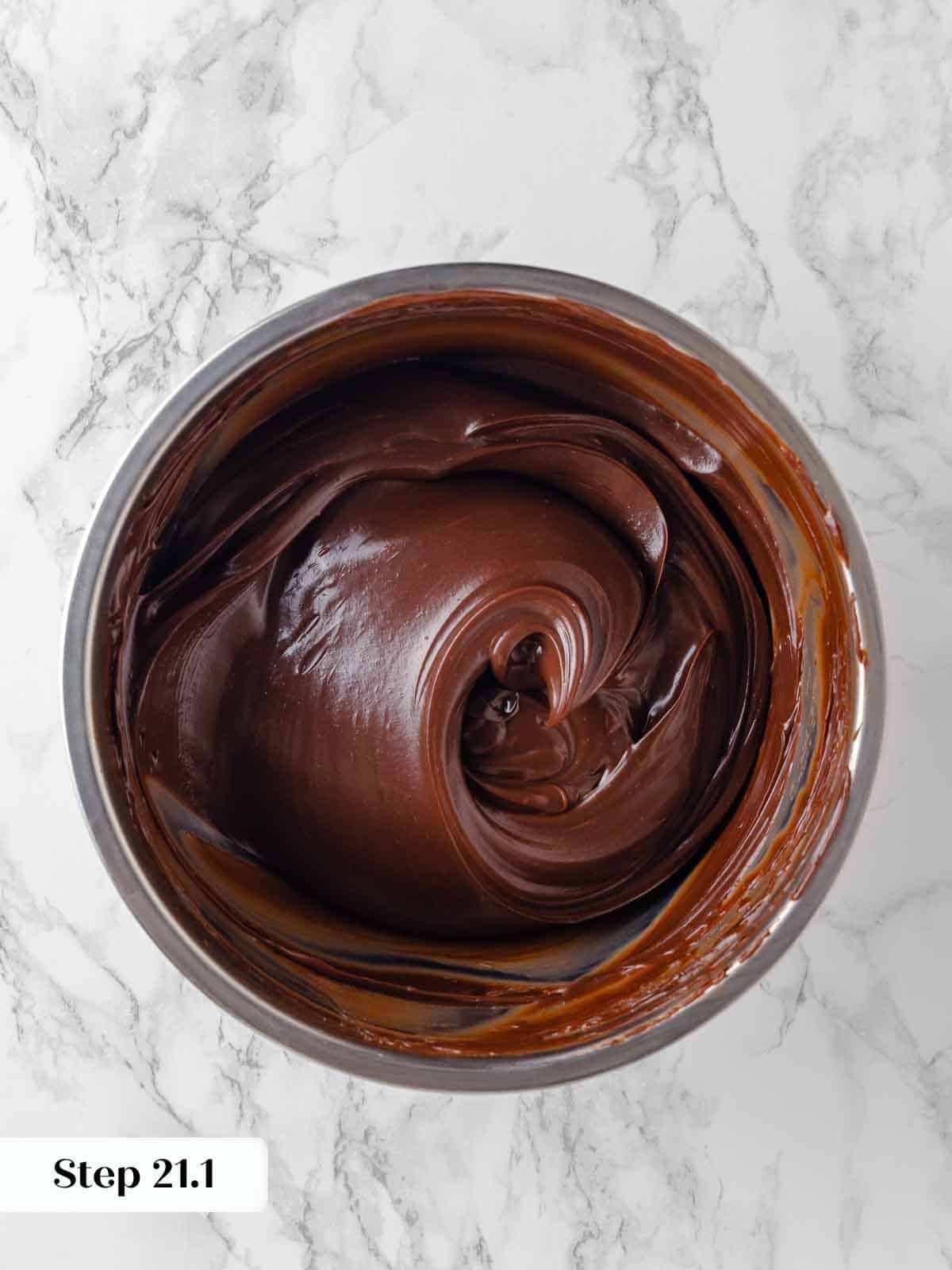 cooled and beautifully swirled caramel fudge frosting for guinness chocolate cake.