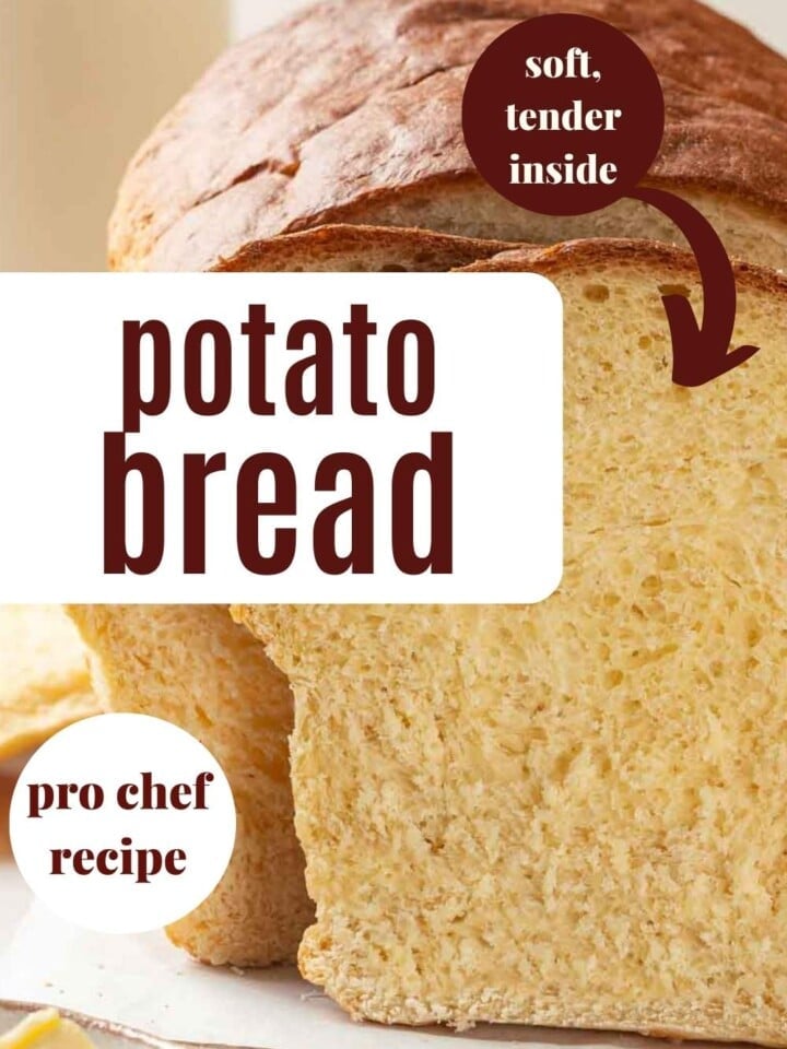 A freshly baked loaf of golden potato bread on a cutting board, showing its soft texture.