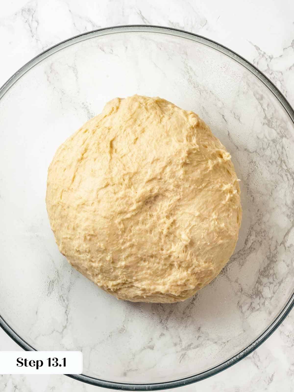 Potato bread dough resting before the first rise in a lightly greased bowl.