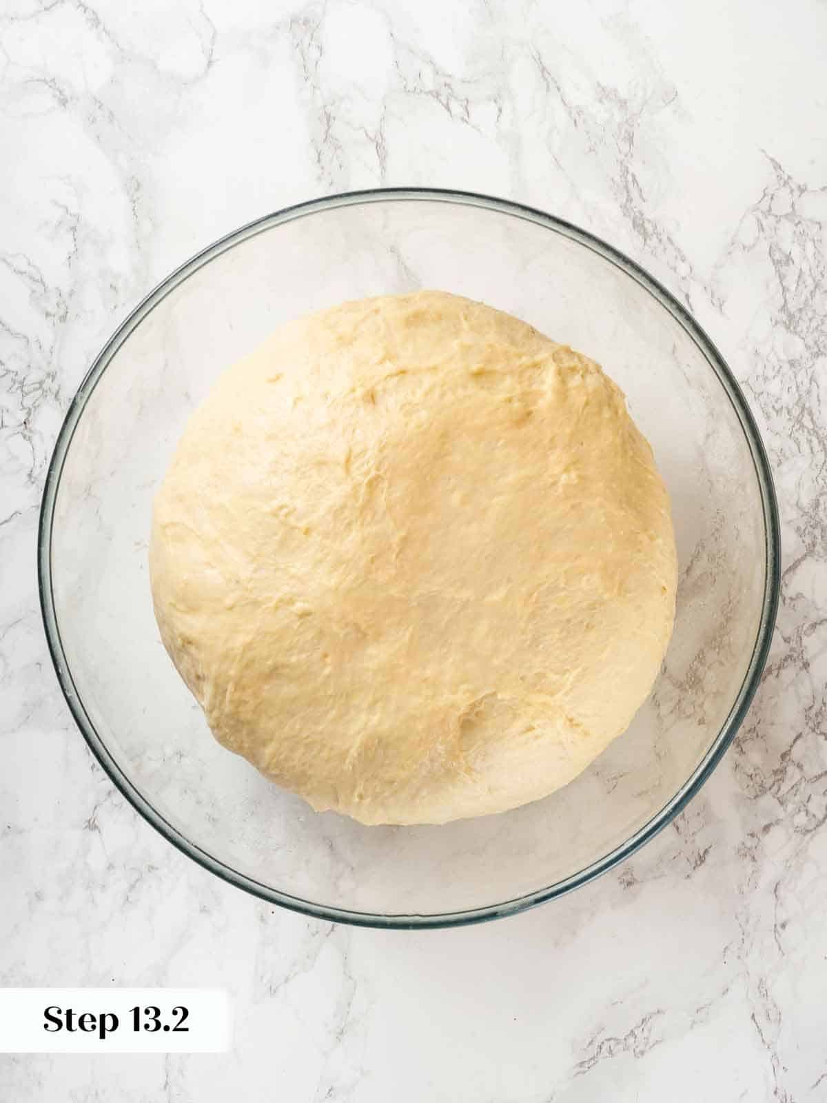 A round of potato bread dough proofed.