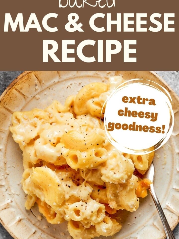A serving of gooey baked mac and cheese on a plate, with a fork twirling a bite of cheesy pasta.