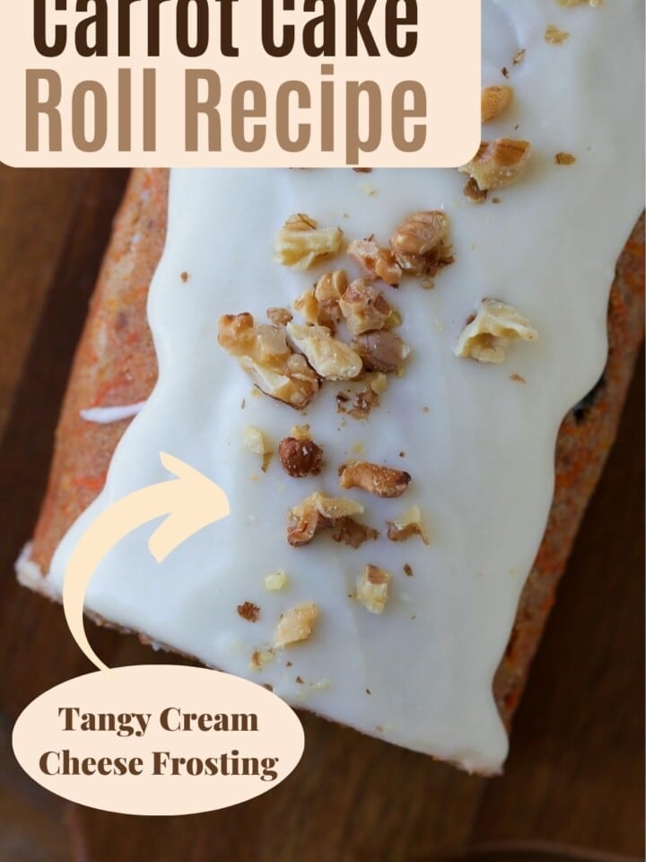 Carrot cake roulade with visible walnuts.